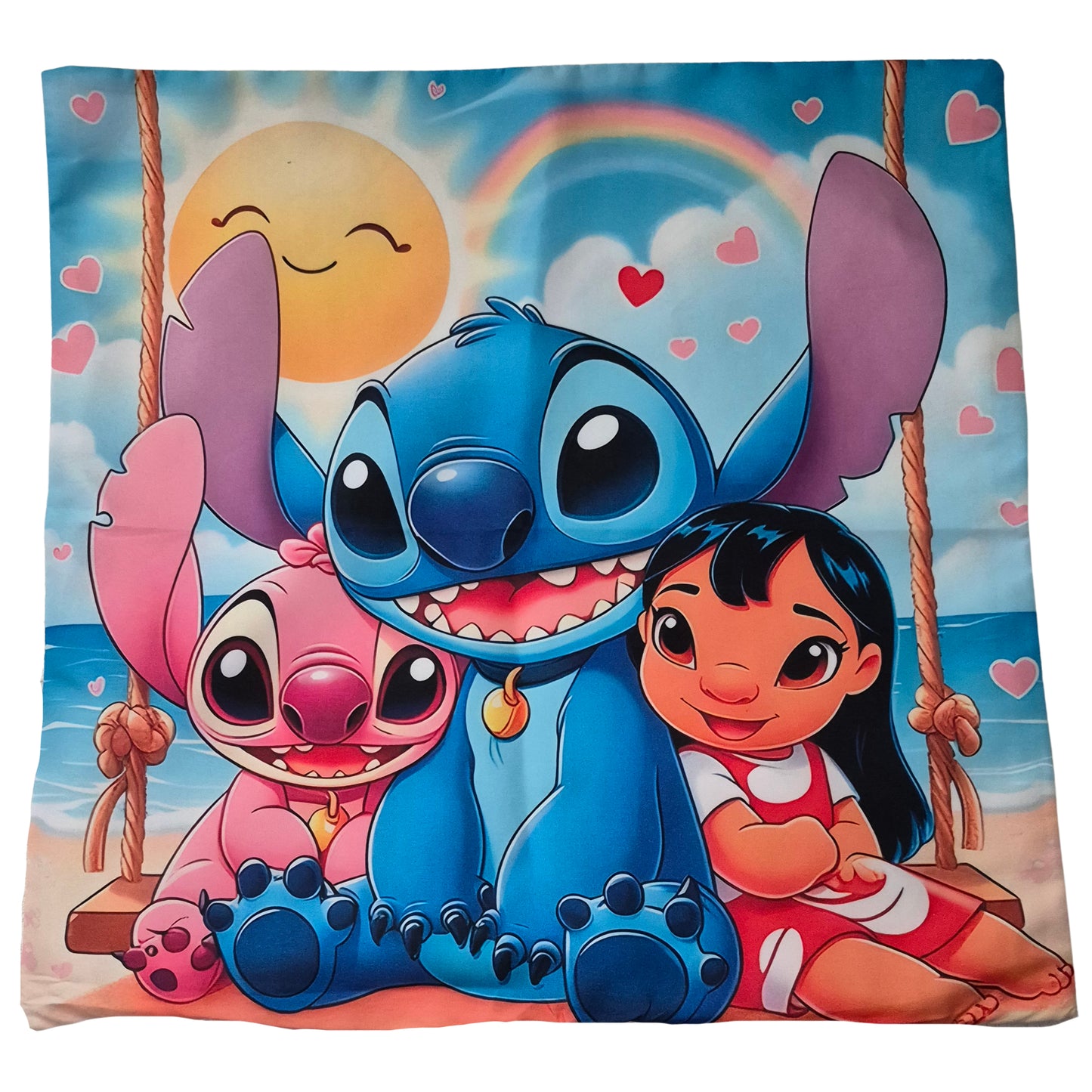 Cartoon characters on a blanket with a beach scene, sun, and rainbow.
